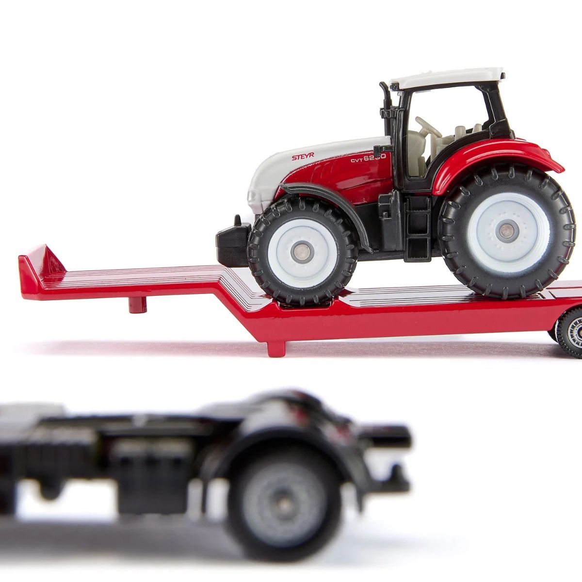 Đồ Chơi Xe Tải MAN Chở Máy Kéo Nông Nghiệp Steyr SIKU 1764